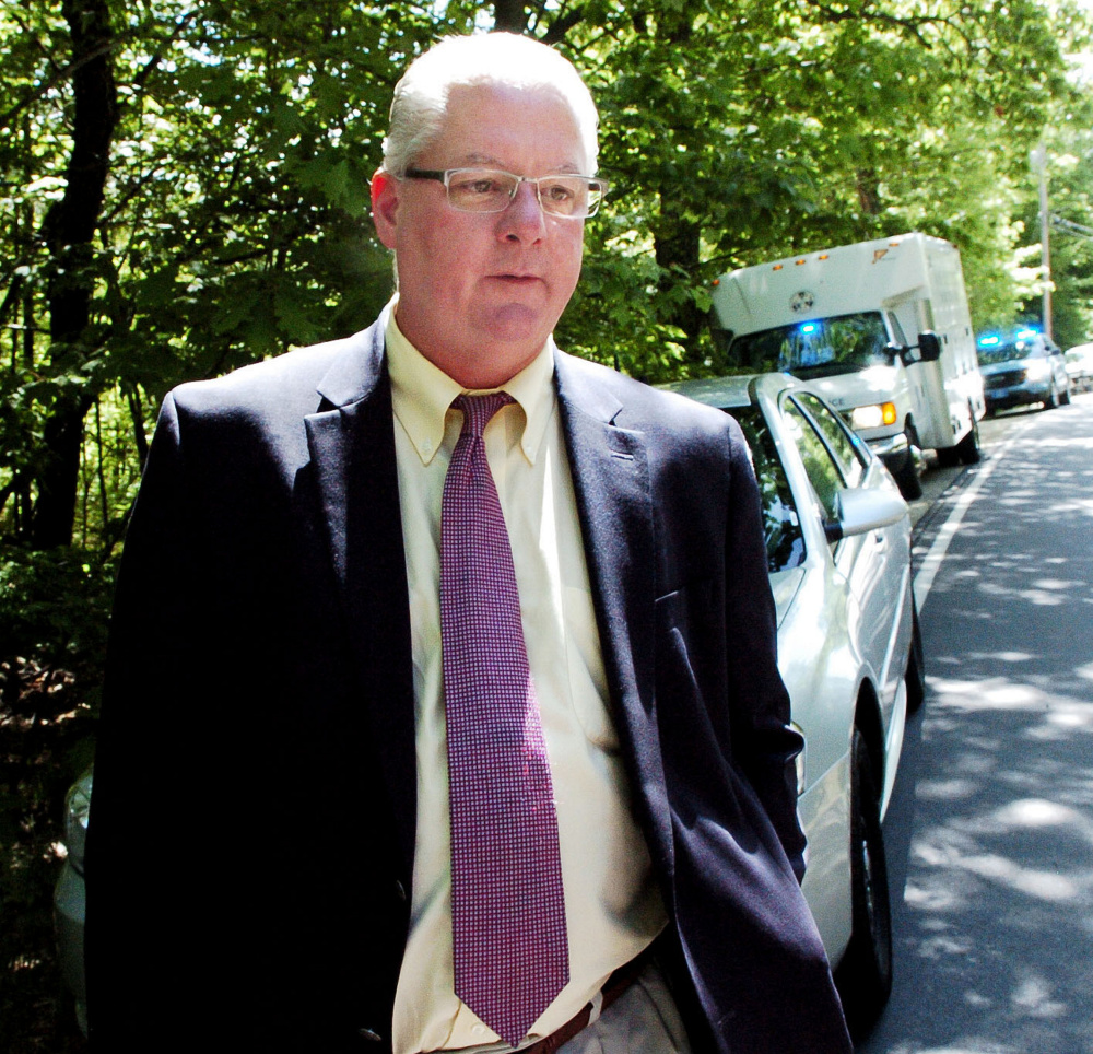 Lt. Brian McDonough, of the Maine State Police, speaks with reporters June 1 outside the property at 259 Weld Road in Wilton where Michael Reis died early that day. Timothy Danforth was arrested Thursday and charged in connection with Reis' death.