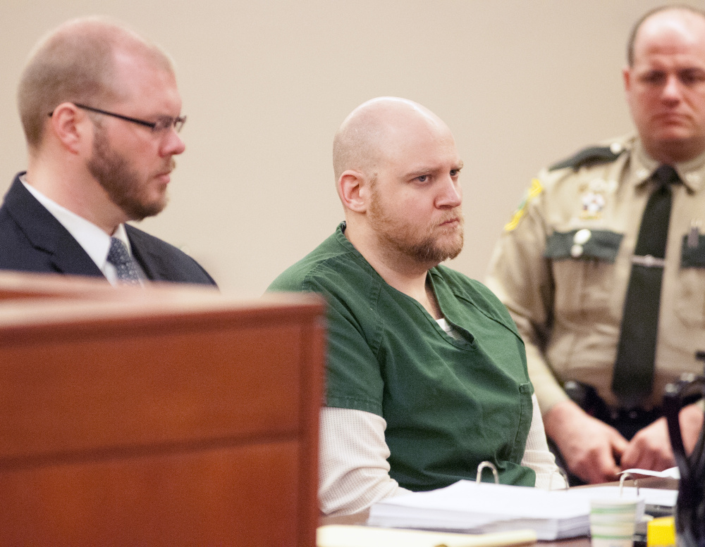 Attorney Scott Hess, left, sits with Wade Hoover during a sentencing hearing on Feb. 24 in the Capital Judicial Center in Augusta. Hoover, who received a 60-year sentence for sexually assaulting two boys who were under age 12, is now contesting the length of the prison term.