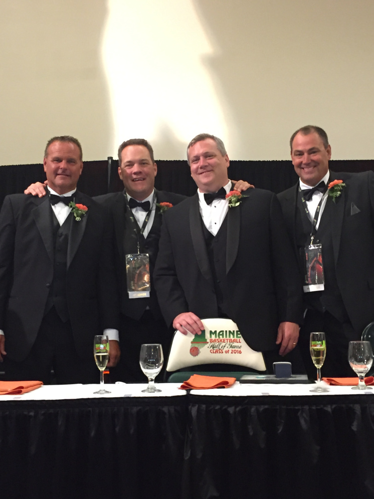 Mike McGee, Gregg Frame, Kevin Whitmore, Harland Storey, from left to right, were inducted into the Maine Basketball Hall of Fame on Sunday in Bangor.