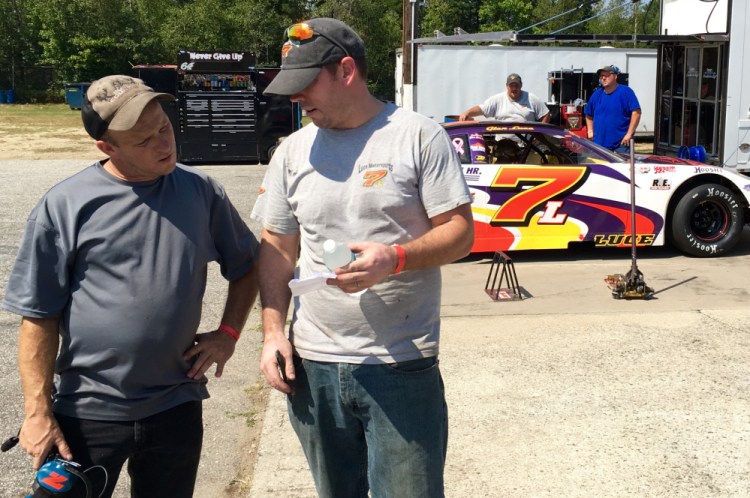 Seth Holbrook, left, talks with Ben Alden during a break in Oxford 250 practice on Friday afternoon at Oxford Plains Speedway. Holbrook has three 250 wins as a crew chief, including last year's with Glen Luce.