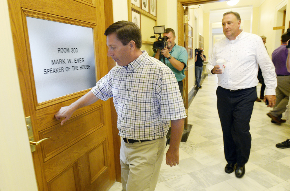 House Minority Leader Ken Fredette, R-Newport, knocks on the door of House Speaker Mark Eves, D-North Berwick, as legislative leaders met to discuss Gov. Paul LePage.