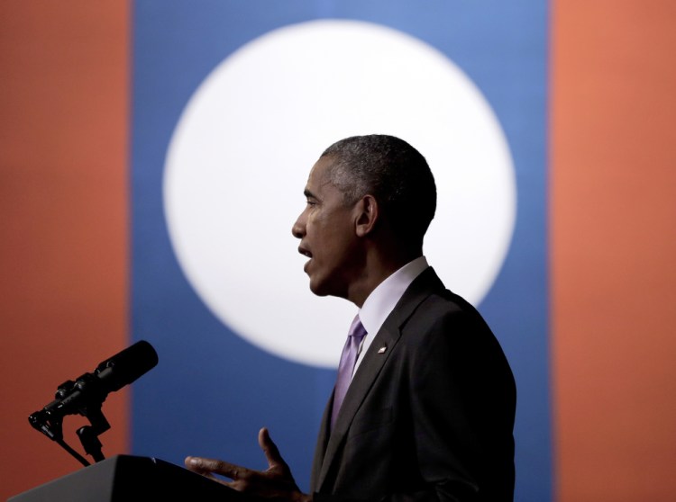 U.S. President Barack Obama speaks at the Lao National Cultural Hall in Vientiane, Laos, Tuesday.