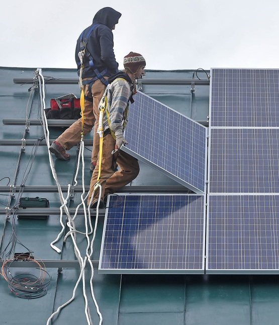 The financial incentive that helps small generators pay for rooftop solar installations like this one is under fire in Maine.