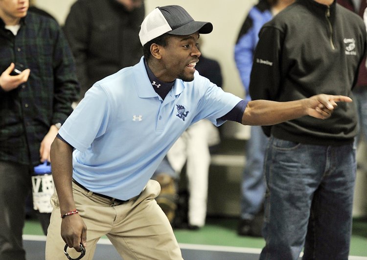Timothy Even cheers on Westbrook track athletes at USM's New Year's Relays and Maine State Pentathlon Championship.