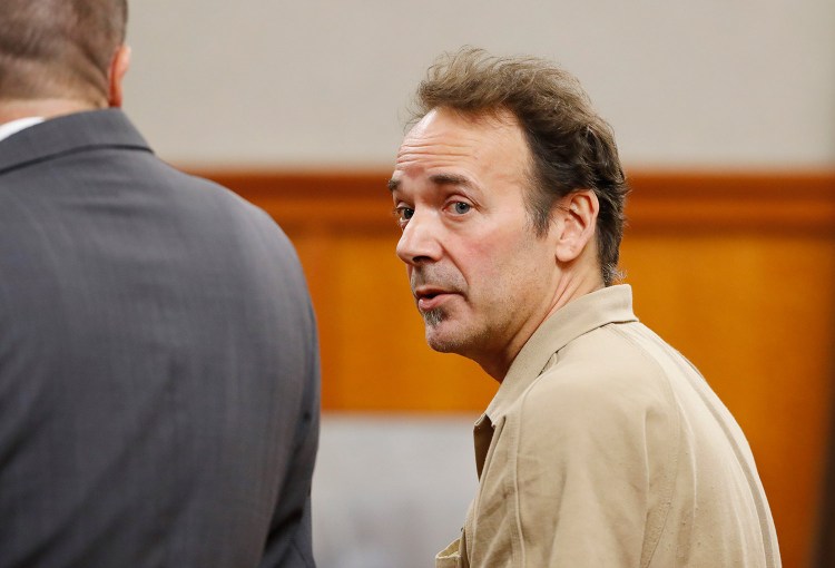 Kelly O'Rourke of Scarborough speaks with his attorney, Robert Andrews, left, before his arraignment Wednesday in Portland. O'Rourke, a social worker, pleaded not guilty to having a sexual relationship with a patient.
Joel Page/Staff Photographer