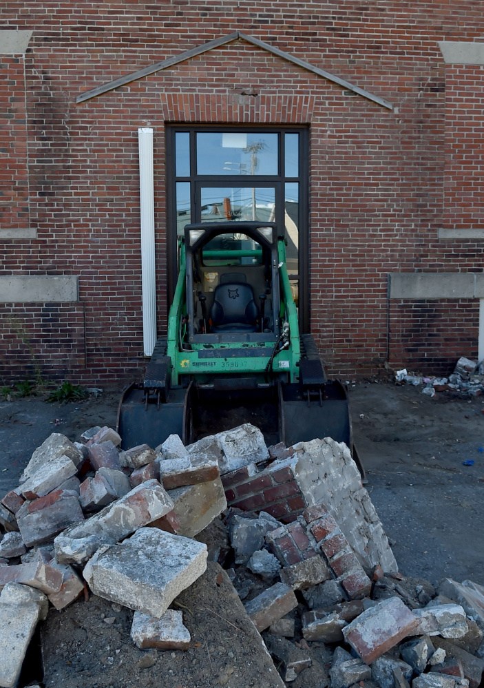 The former Elks building at 13-15 Appleton St. in Waterville, seen Friday, will be demolished soon and replaced by a parking lot as part of downtown revitalization efforts.