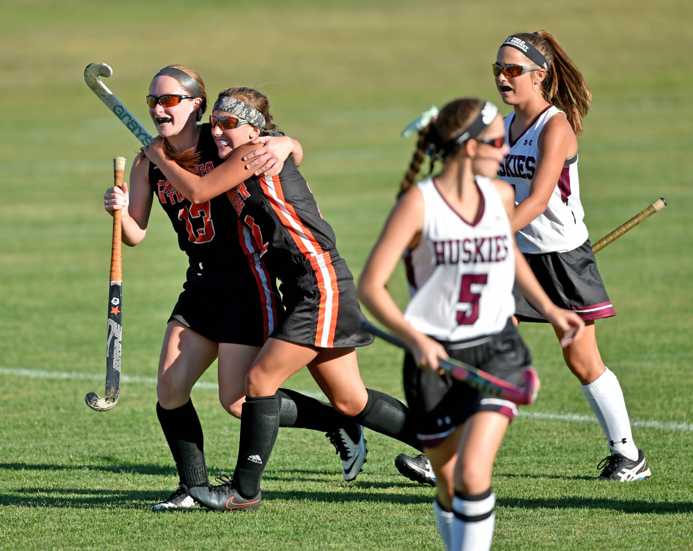 Gardiner's Hailee Lovely (13) gets a hug from teammate Haley Brann (2) after her goal against Maine Central Institute on Thursday in Pittsfield.