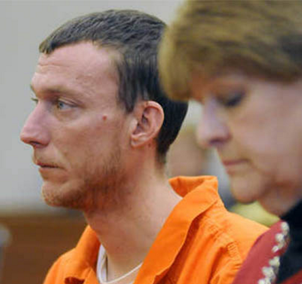 Mark Halle, of Waterville, listens during his bail hearing with his attorney, Pamela Ames, in February in the Capital Judicial Center in Augusta.