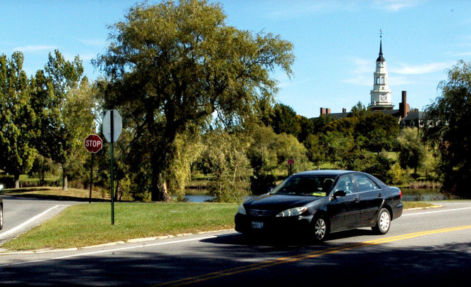 Traffic passes at the intersection of Armstrong Road and Washington Street in Waterville near the Colby College campus in Waterville on Monday. Todd Michaud reported that Donald Trump signs he placed on the public right-of-way were stolen over the weekend.