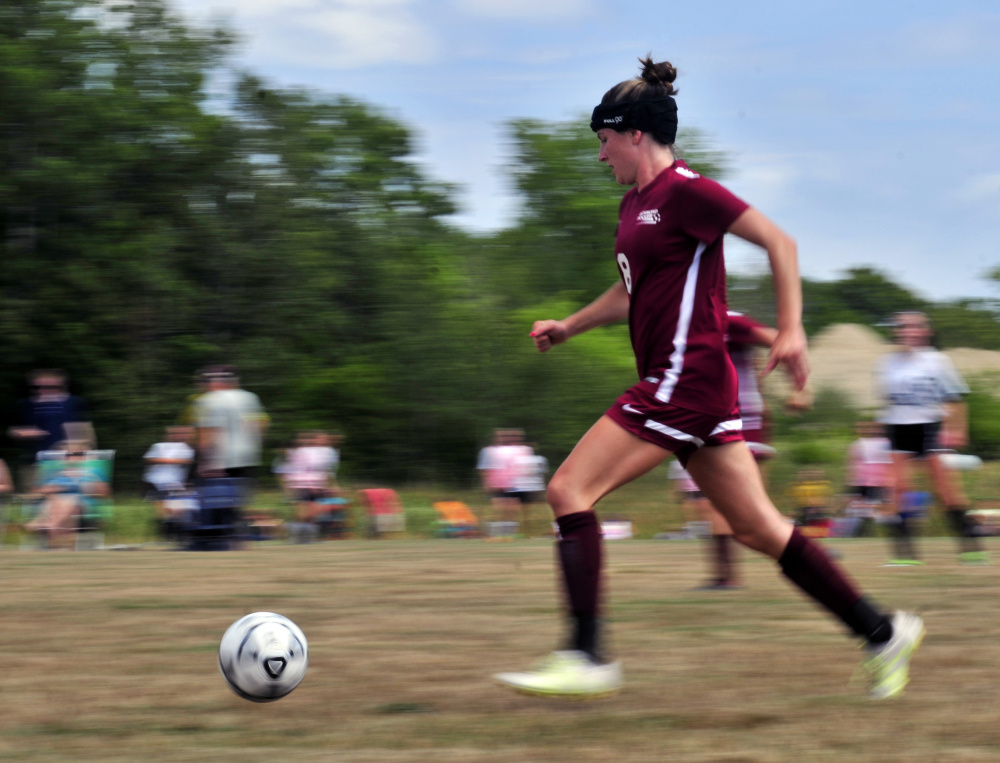 Richmond forward Meranda Martin chases a ball during an Aug. 20 preseason game at Richmond High School.