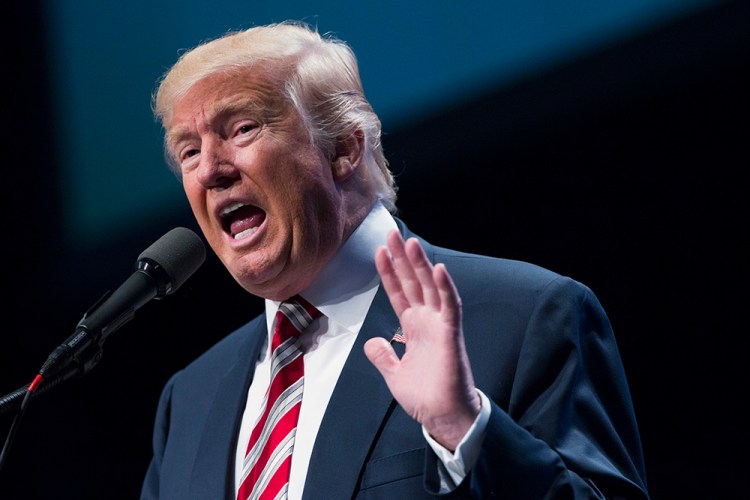 Republican presidential candidate Donald Trump speaks at the Shale Insight Conference, Thursday in Pittsburgh. "It's the job of the next president of the United States to work with our governors and mayors to address this crisis and save African-American lives."<em>Evan Vucci/Associated Press </em>