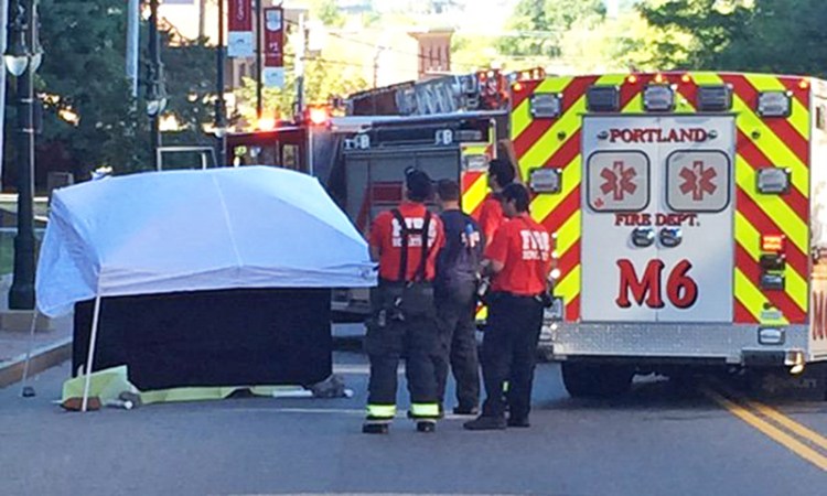 Portland police and fire on Congress Street Thursday morning where a man apparently jumped to his death.