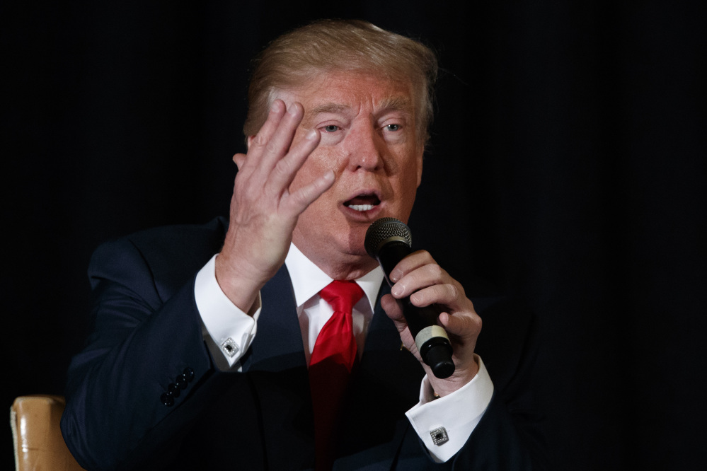 Republican presidential candidate Donald Trump speaks during a town hall with the Retired American Warriors Monday in Herndon, Va.