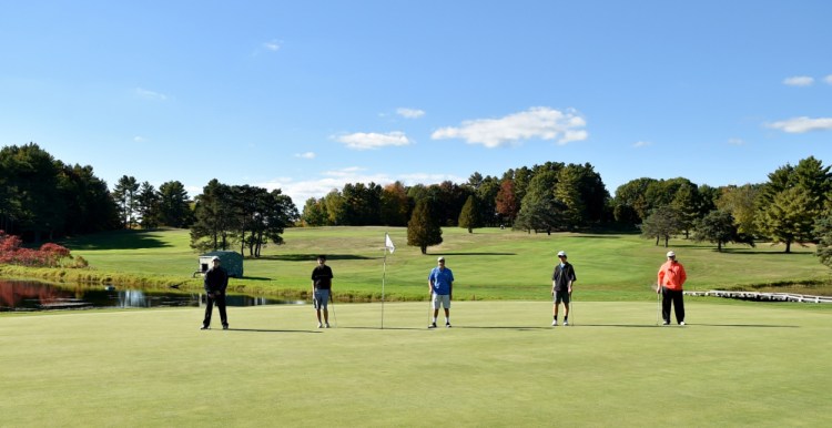 Erskine golfers, from left, Justin Browne, Robert Harmon, Brandon Keezer, Connor Paine and Aaron Pion stand for a portrait during golf practice at Natanis Golf Course in Vassalboro on Wednesday. The Eagles will compete for a Class B state championship Saturday at Natanis.