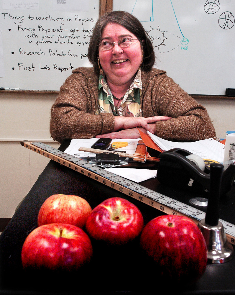 Former veterinarian and now science teacher Kjerstin Winn speaks inside her class room at Forest Hills Consolidated School in Jackman on Thursday.