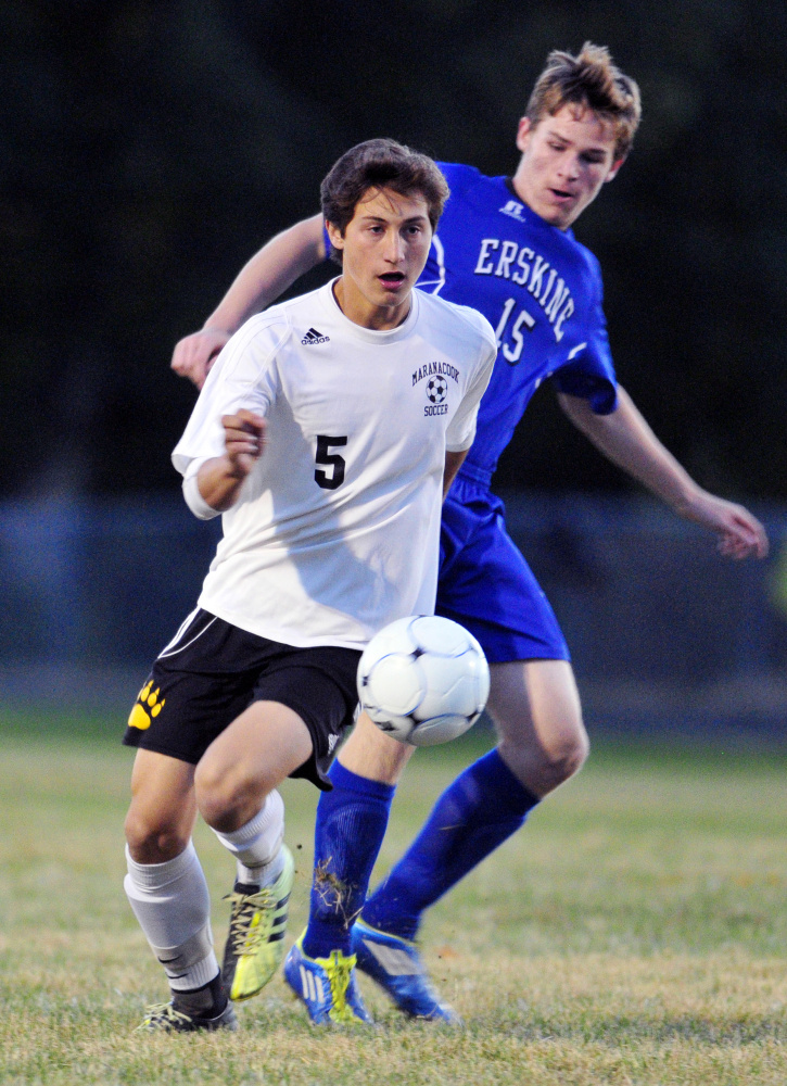 Maranacook's Jackson McPhedran, left, tries to get past Erskine's Christopher Weymouth during a game Tuesday at the Ricky Gibson Field of Dreams in Readfield.