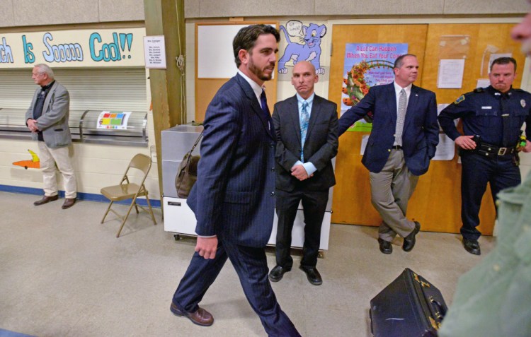 Waterville Senior High School principal Don Reiter leaves a public hearing Nov. 10, 2015, at George J. Mitchell School in Waterville.