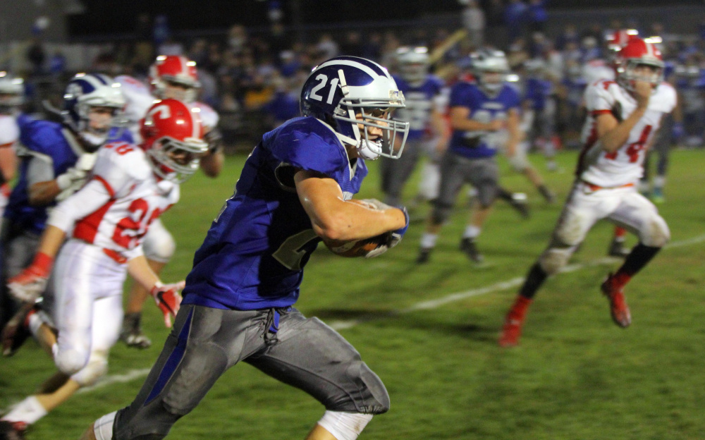 Lawrence running back Gunner McAllister turns up field for a big gain during the first half of a Sept. 24 Pine Tree Conference Class B game in Fairfield.