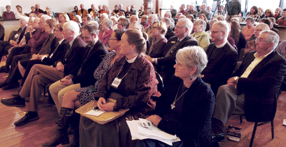 Nearly 200 church leaders and members of the Maine Council on Churches listen to U.S. Sen. George Mitchell's talk about political civility Thursday in Waterville.