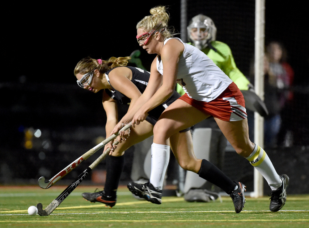 Skowhegan sophomore Allyssa Salley, left, battles for the ball with Messalonskee's Lydia Dexter during an Oct. 11 Kennebec Valley Athletic Conference Class A game at Thomas College.