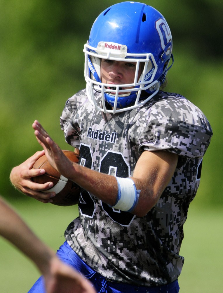 Oak Hill running back Cruz Poirier runs during a Sept. 10 game aganst Old Orchard Beach.