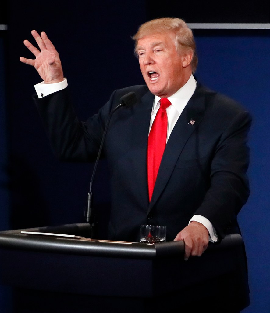 Republican presidential nominee Donald Trump debates Democratic presidential nominee Hillary Clinton during the third presidential debate at UNLV in Las Vegas, Wednesday.