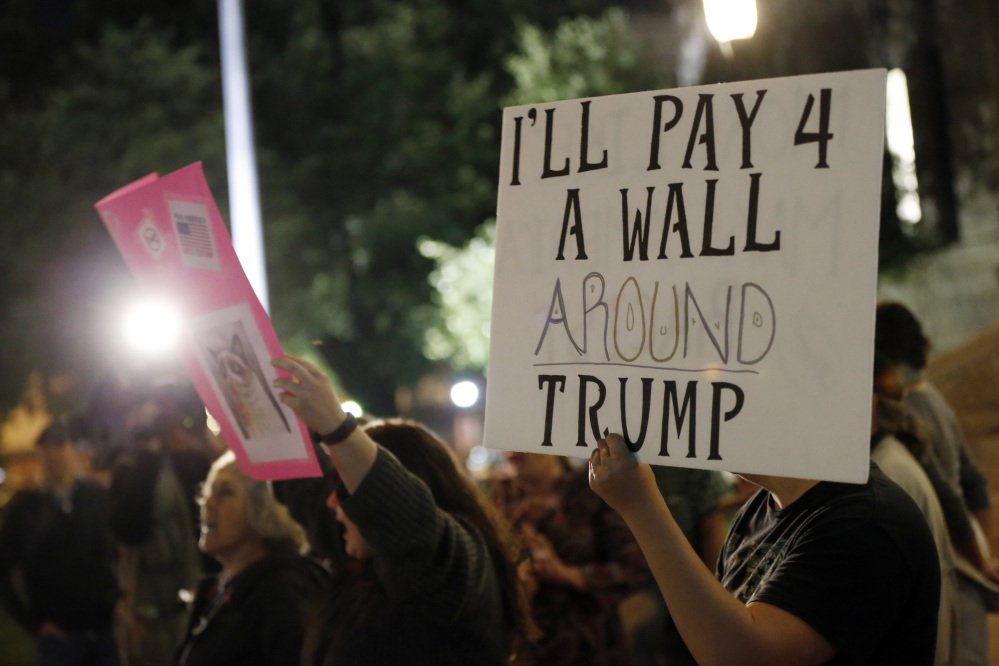 Protesters in Fort Worth, Texas, rail against Donald Trump's victory. 