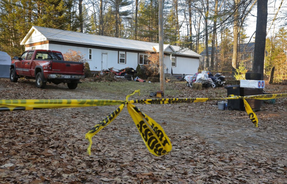 Sheriff's tape cordons off the house at 73 Songo School Road in Naples on Monday. Police say Richard Diekema was shot and killed early Sunday morning by Norman Strobel inside the two-bedroom mobile home.