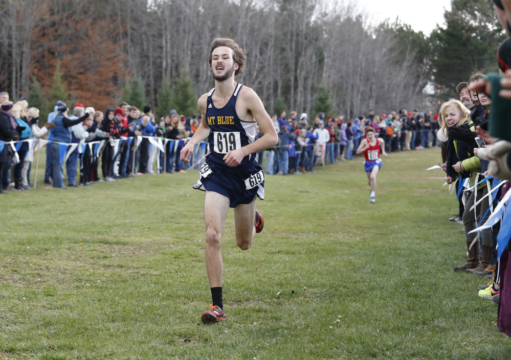 Portland Press Herald Photo by Joel Page
Mt. Blue senior Tucker Barber approaches the finish line to win the Class A boys state championship Saturday at Troy Howard Middle School in Belfast.