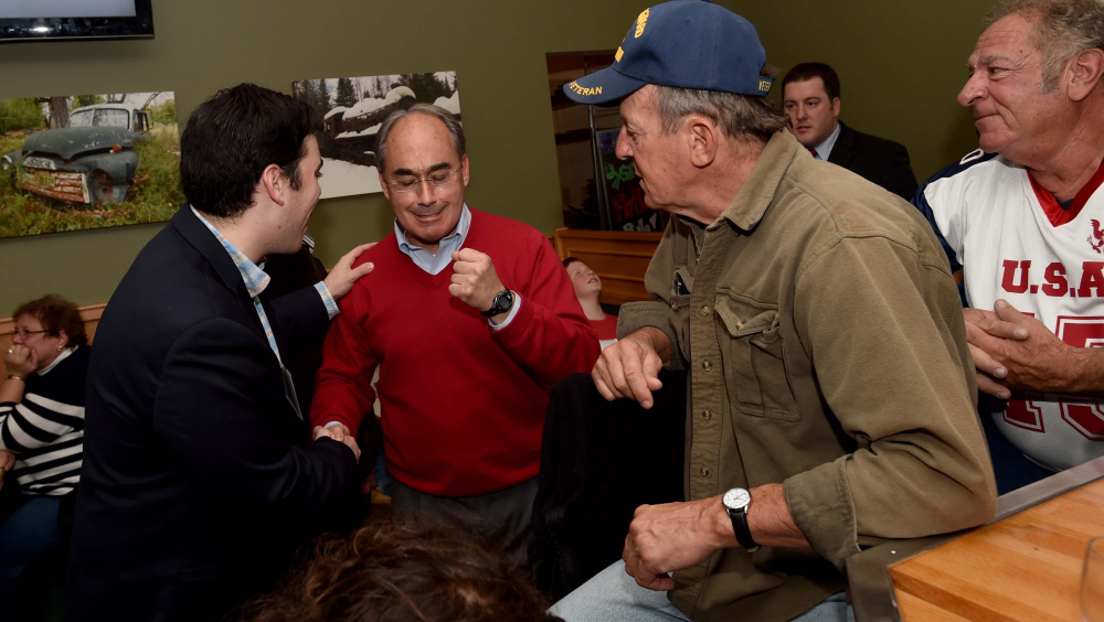 U.S. Rep. Bruce Poliquin visits with supporters at Dysart's Restaurant and Bakery in Bangor after the polls closed on Tuesday.