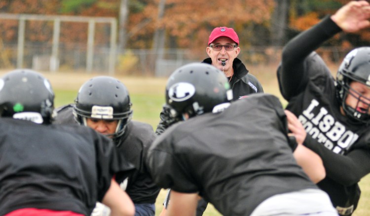 Lisbon head football coach Dick Mynahan watches the team practice Tuesday in Lisbon.