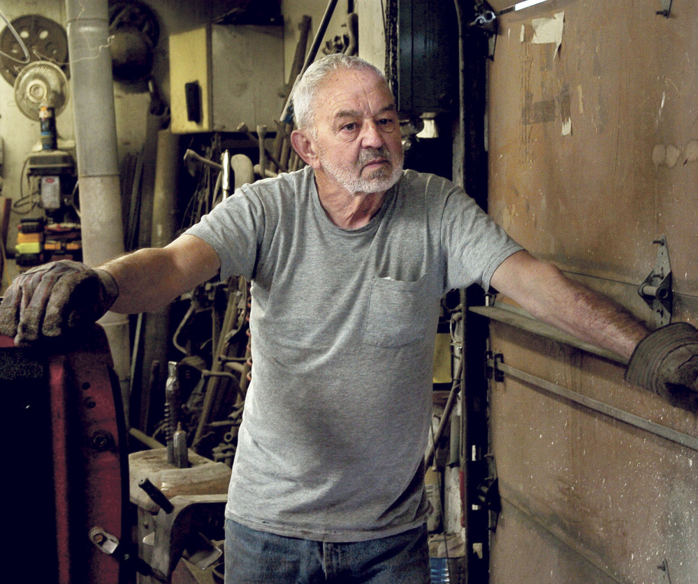 Longtime Vassalboro resident Al Roy has a close-up view of Outlet Stream, which runs past his home and shop on South Stanley Hill Road, and concerns about efforts to allow alewives to reach China Lake on Wednesday.