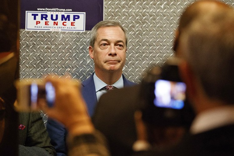 U.K. Independence Party leader Nigel Farage gets on an elevator at Trump Tower in New York on Nov. 12. Farage has told friends that he is preparing to emigrate to the United States – possibly Maine.