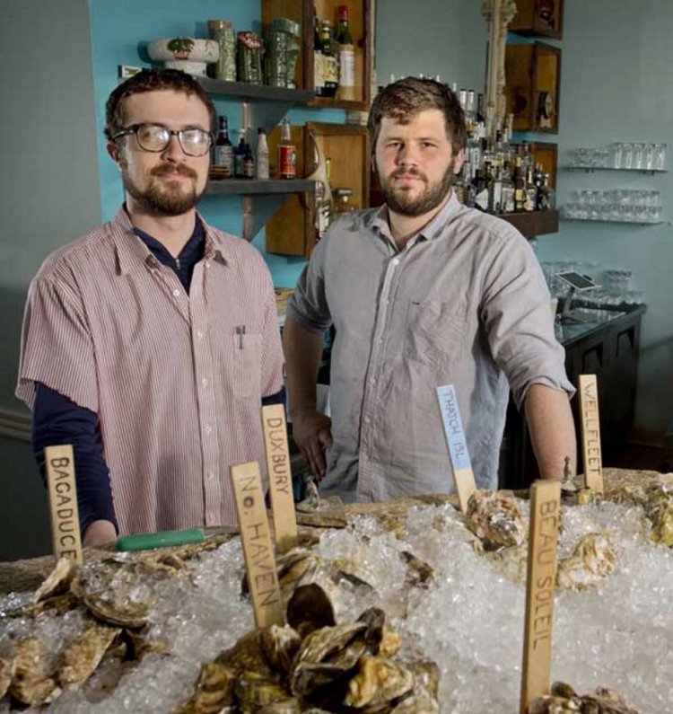Mike Wiley, left, shown in 2013 with Andrew Taylor, fellow owner and chef of Eventide Oyster Co., says of a planned expansion into Boston: "It's less seasonal down there."
