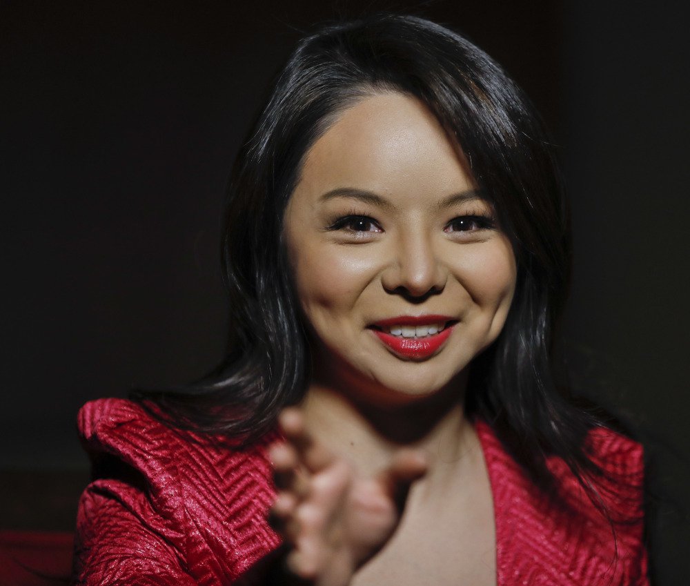 Anastasia Lin, 26, Canada's entrant to Miss World pageant, answers questions on Wednesday.