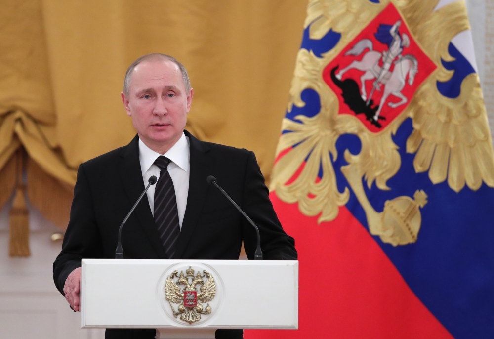 Russian President Vladimir Putin said Friday that Moscow would not eject American diplomats in response to what he described as "provocation aimed at further undermining Russian-American relations."