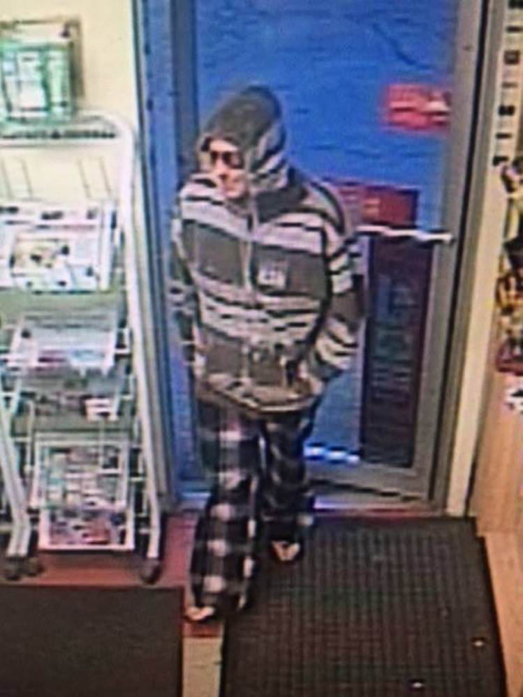 Police issued this photo in connection with a June 21 robbery at The Big Apple store on Stone Street. The suspect, later identified as Jessica L. Morang, pleaded guilty Wednesday to committing that robbery.