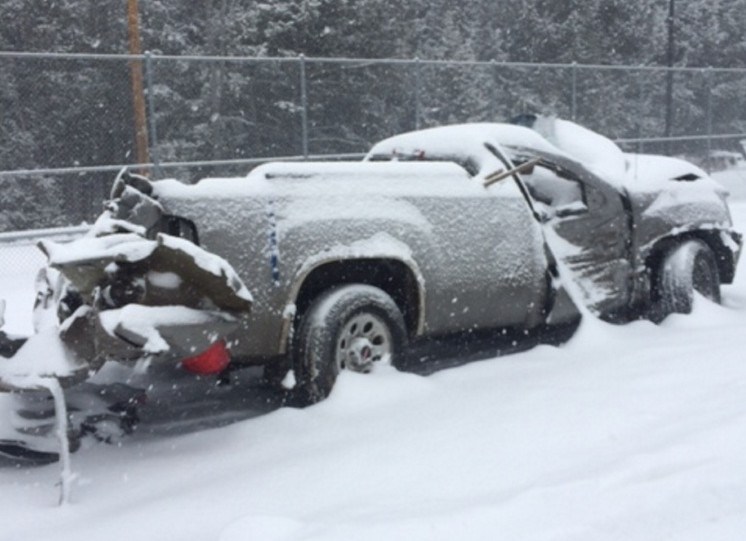 The 2007 GMC Sierra truck in this photo provided by the Somerset County Sheriff's Office veered off Bog Road in New Portland early Monday morning. The crash resulted in the death of the driver, Connor Graham, 21, of Hampden.