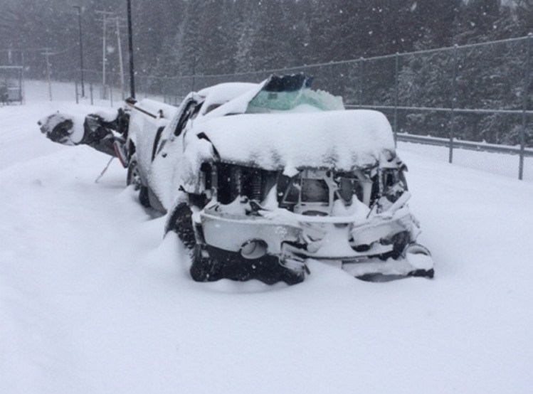 The 2007 GMC Sierra truck in this photo provided by the Somerset County Sheriff's Office veered off Bog Road in New Portland early Monday morning. The crash resulted in the death of the driver, Connor Graham, 21, of Hampden.