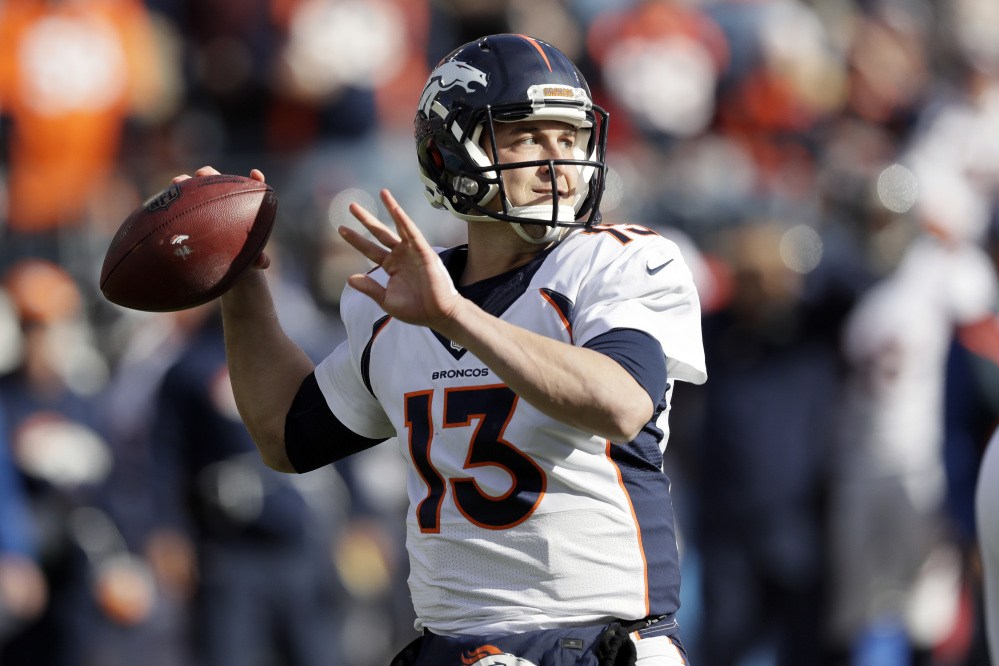 Denver Broncos quarterback Trevor Siemian passes against the Titans in the first half of a game Sunday in Nashville, Tennessee.