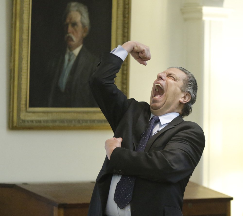 Sha Na Na's John "Bowzer" Bauman strikes his signature pose Wednesday – just like the one from his younger days, below – during an event at First Parish Church in Portland. The singer and political activist urged the crowd to press their representatives in Congress to oppose efforts to weaken Medicare or Social Security.