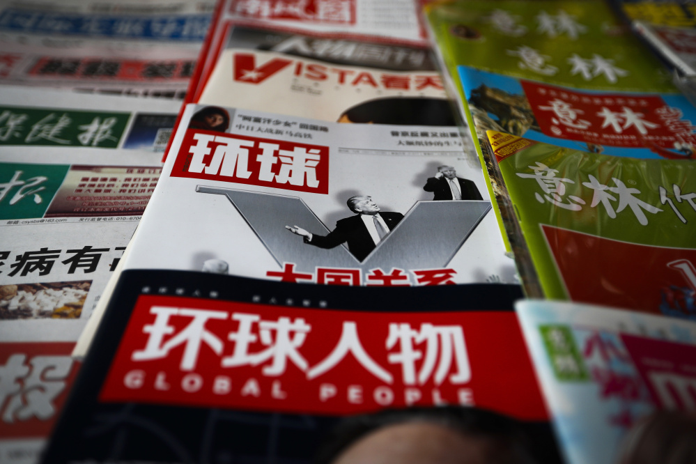 A magazine's front-page showing Donald Trump and the headline "Relations of Great Powers" is displayed at a Beijing newsstand Dec. 13. The U.S. and China face some common challenges.