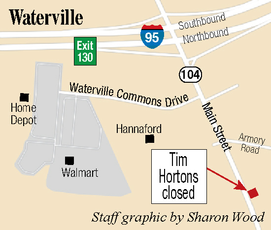 Signs posted at the drive-up window at Tim Hortons restaurant in Waterville on Monday state the business has been closed.