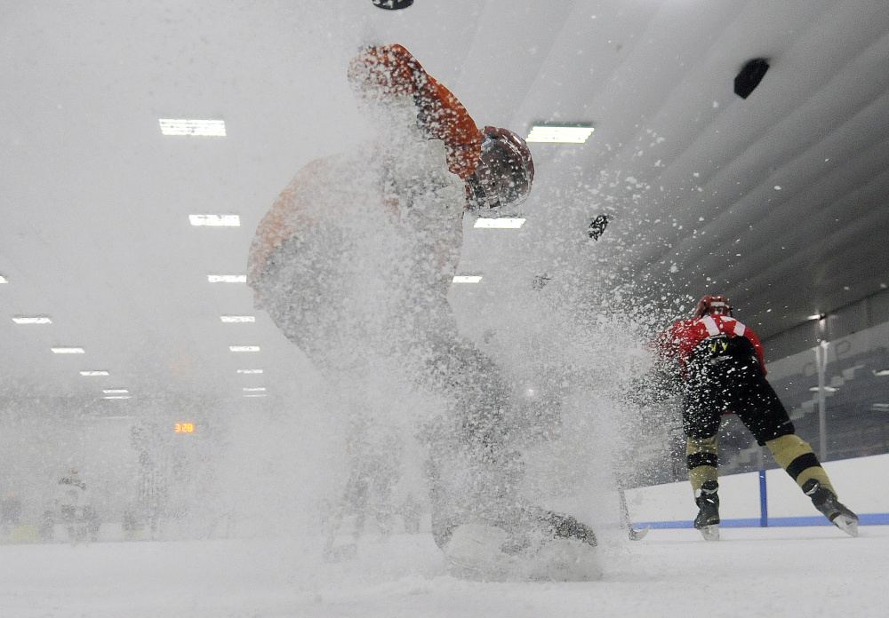 Cony's Tyler Dostie works through a drill during a Nov. 21 practice at the Camden National Bank Ice Vault. The Rams (4-2-0) are third in Class A North Heal points.