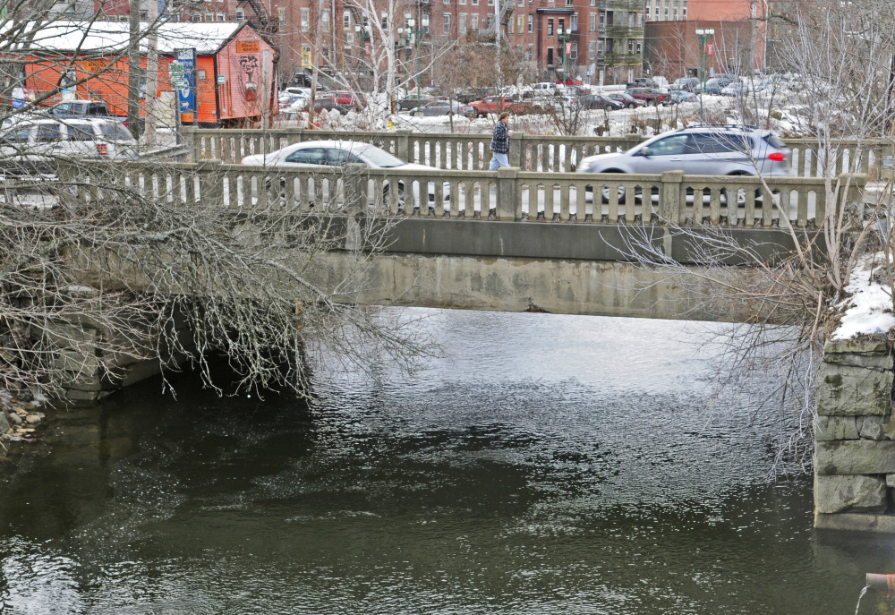 This Friday photo shows the Maine Avenue Bridge over Cobbosseecontee Stream in Gardiner, where work is scheduled to take place in 2018.