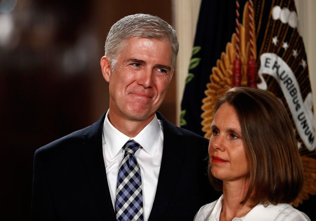 Judge Neil Gorsuch stands with his wife, Louise, as President Trump announces him as his nominee for the Supreme Court. The nominee is expected to face intense scrutiny from Democrats. 