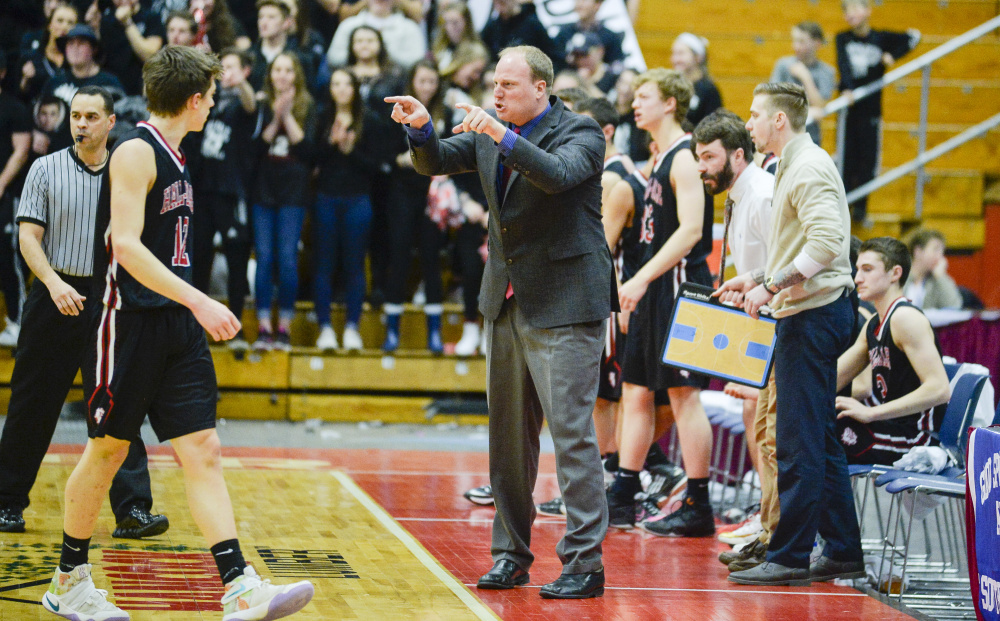 Hall-Dale coach Chris Ranslow reacts to a foul by North Yarmouth Academy in the first quarter of a Class C South quarterfinal game Monday at the Augusta Civic Center.