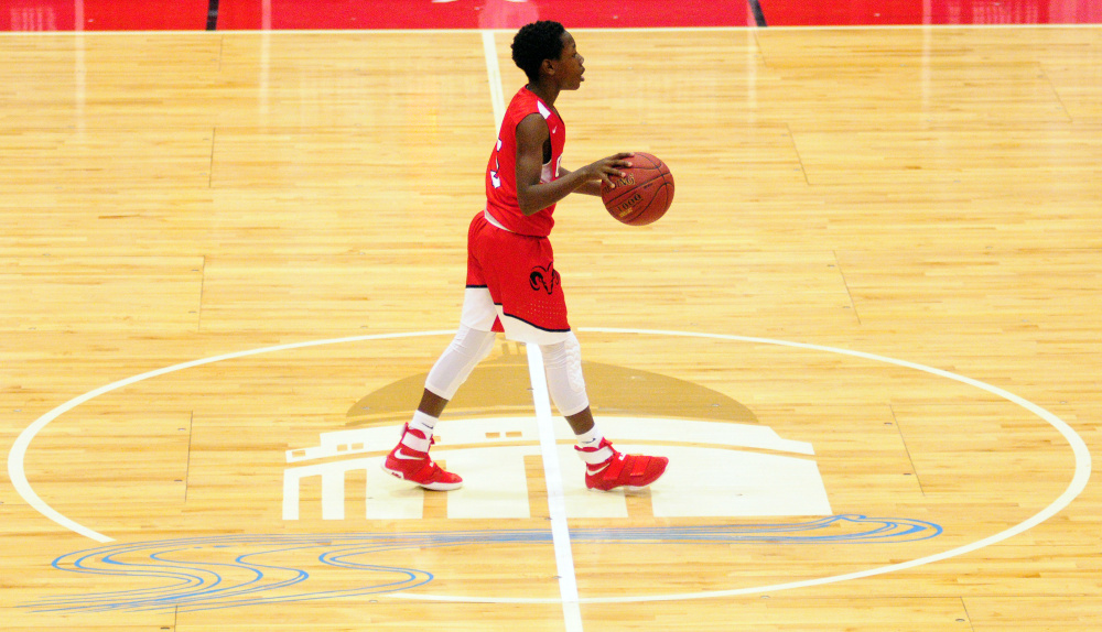 Simon McCormick moves the ball during a Class A North quarterfinal game last Saturda at the Augusta Civic Center.