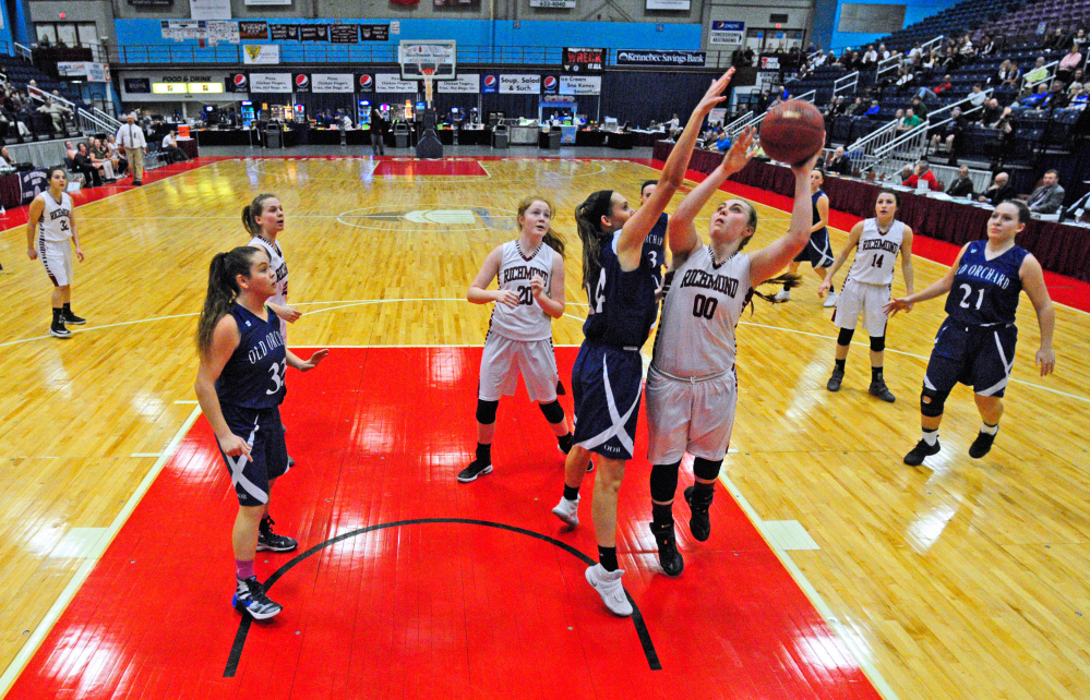 Richmond's Sidney Tilton shoots against Old Orchard during a Class C semifinal game Thursday at the Augusta Civic Center.