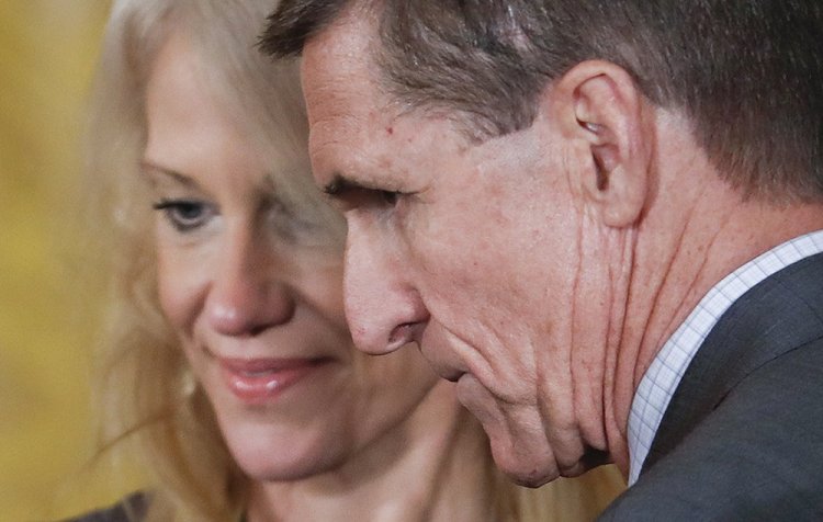 National Security Adviser Michael Flynn and Counselor to the President Kellyanne Conway take their seats before the start of a joint news conference with President Donald Trump and Canadian Prime Minister Justin Trudeau in the East Room of the White House Monday.